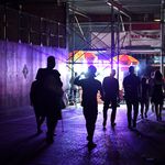 People walking under scaffolding during the power outage on July 13 (Erik Pendzich/Shutterstock)